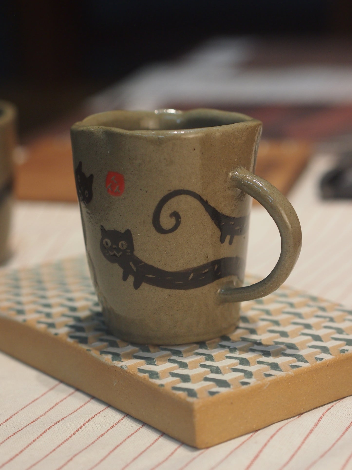 Ceramic stoneware handpinched cat mug with handpainted cat, perfect for gifting a coffee or tea enthusiast made in Malaysia, KL. Shipping to Singapore available.