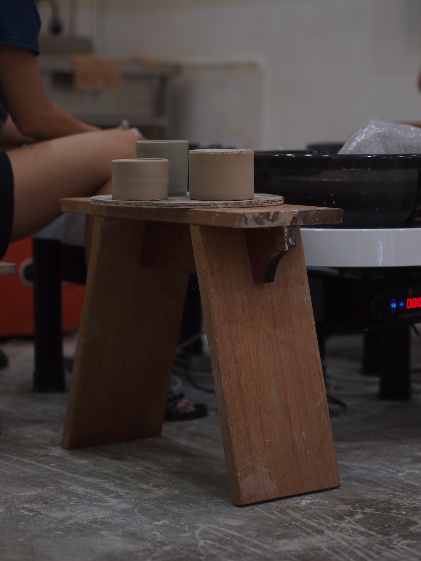Real wood stool for apartment landings, cafe seating areas, and garden, waterproof, weatherproofed, naturally finished.  KL, Malaysia.