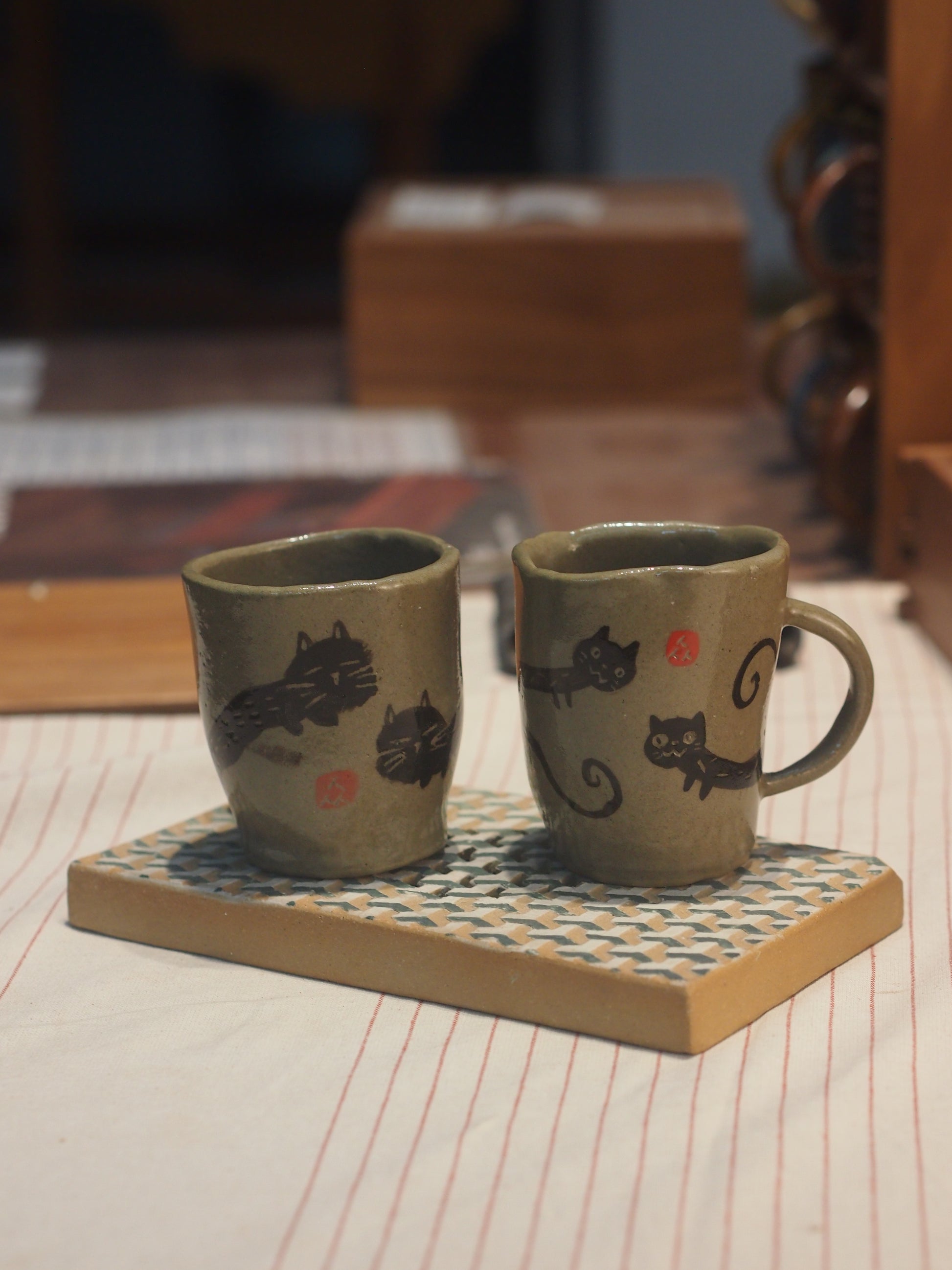 Ceramic stoneware handpinched cat mug with handpainted cat, perfect for gifting a coffee or tea enthusiast made in Malaysia, KL. Shipping to Singapore available.