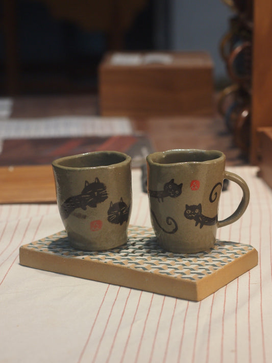 Ceramic stoneware handpinched cat mug with handpainted cat, perfect for gifting a coffee or tea enthusiast made in Malaysia, KL. Shipping to Singapore available.
